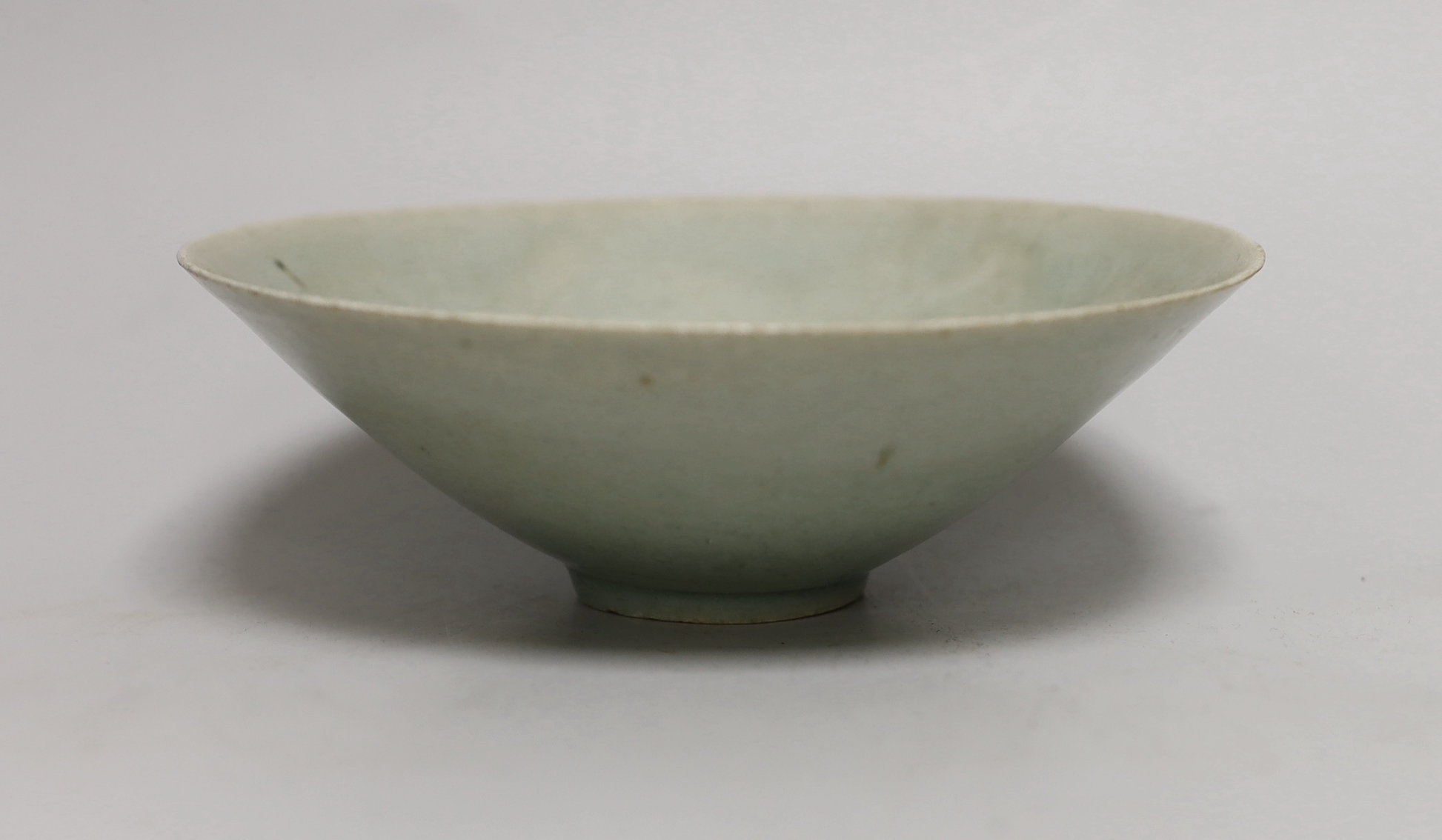 A Chinese celadon bowl, 17cm diameter